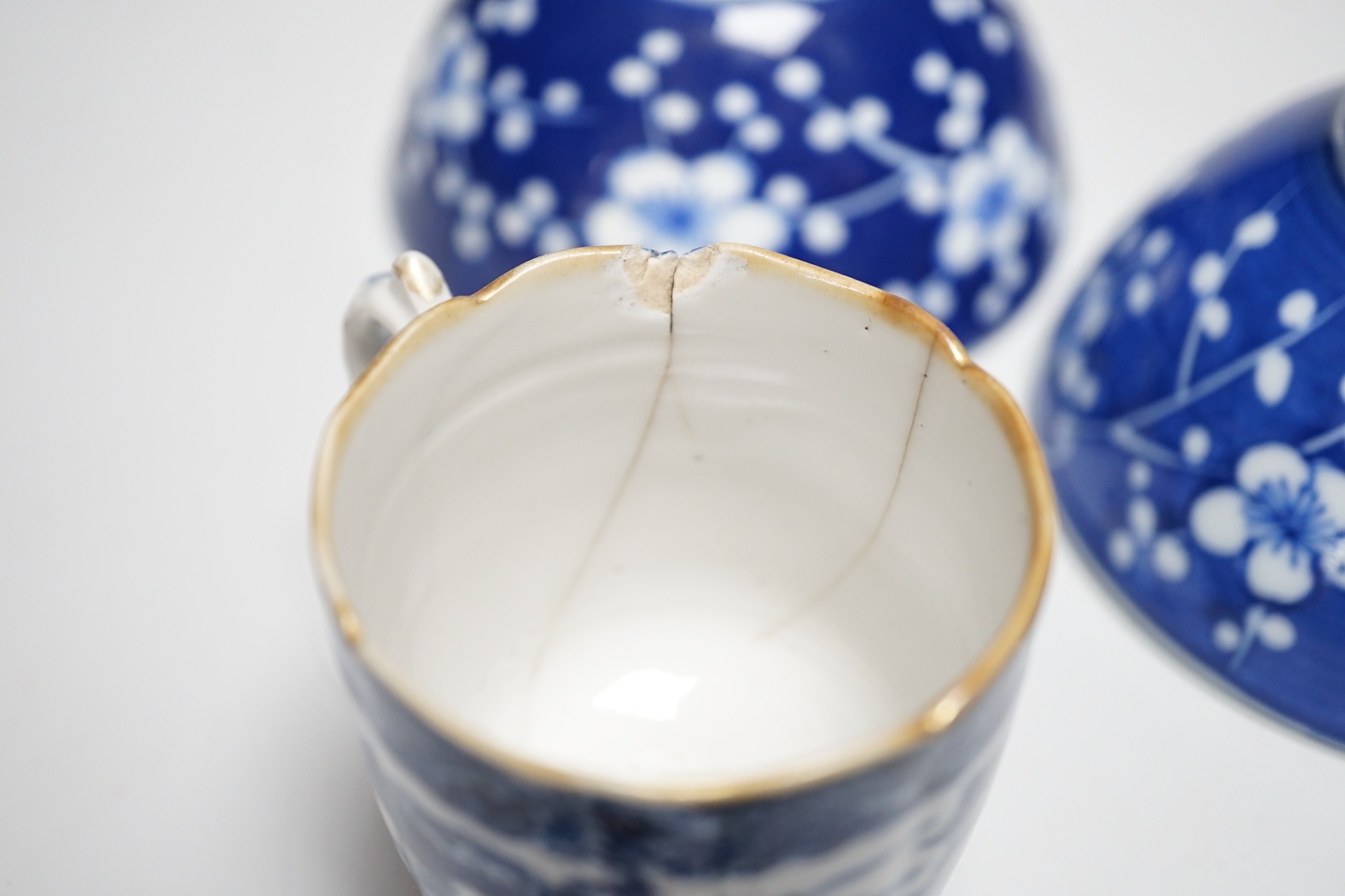 A group of mixed Chinese and Japanese porcelain vessels, tallest 11 cm